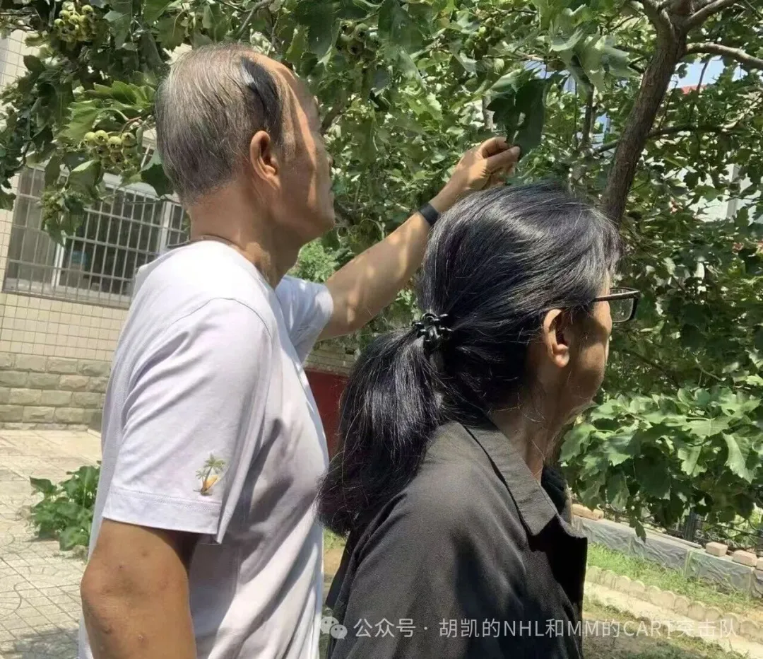 Mr. Jiang and his wife during a follow-up visit at Beijing GOBROAD Hospital, 11 years into his primary CNS lymphoma survivorship journey